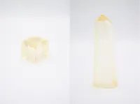 Solange Knowles' unfinished glass sculptures: a translucent yellow cube and a tall, pointed prism