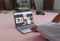 PinkPantheress designs custom ballet flats on a laptop, surrounded by music studio equipment